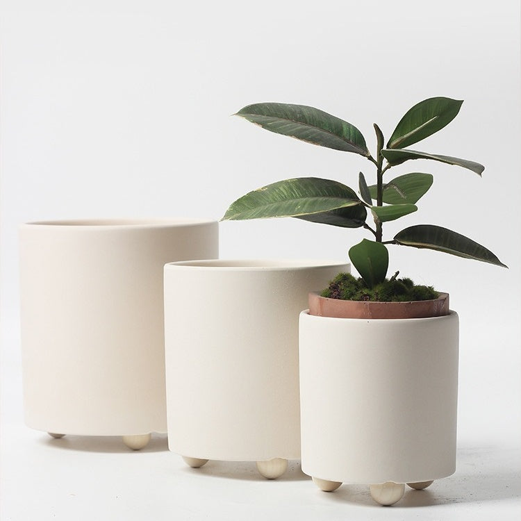 Nordic Unglazed Ceramic Planter with Wooden Legs